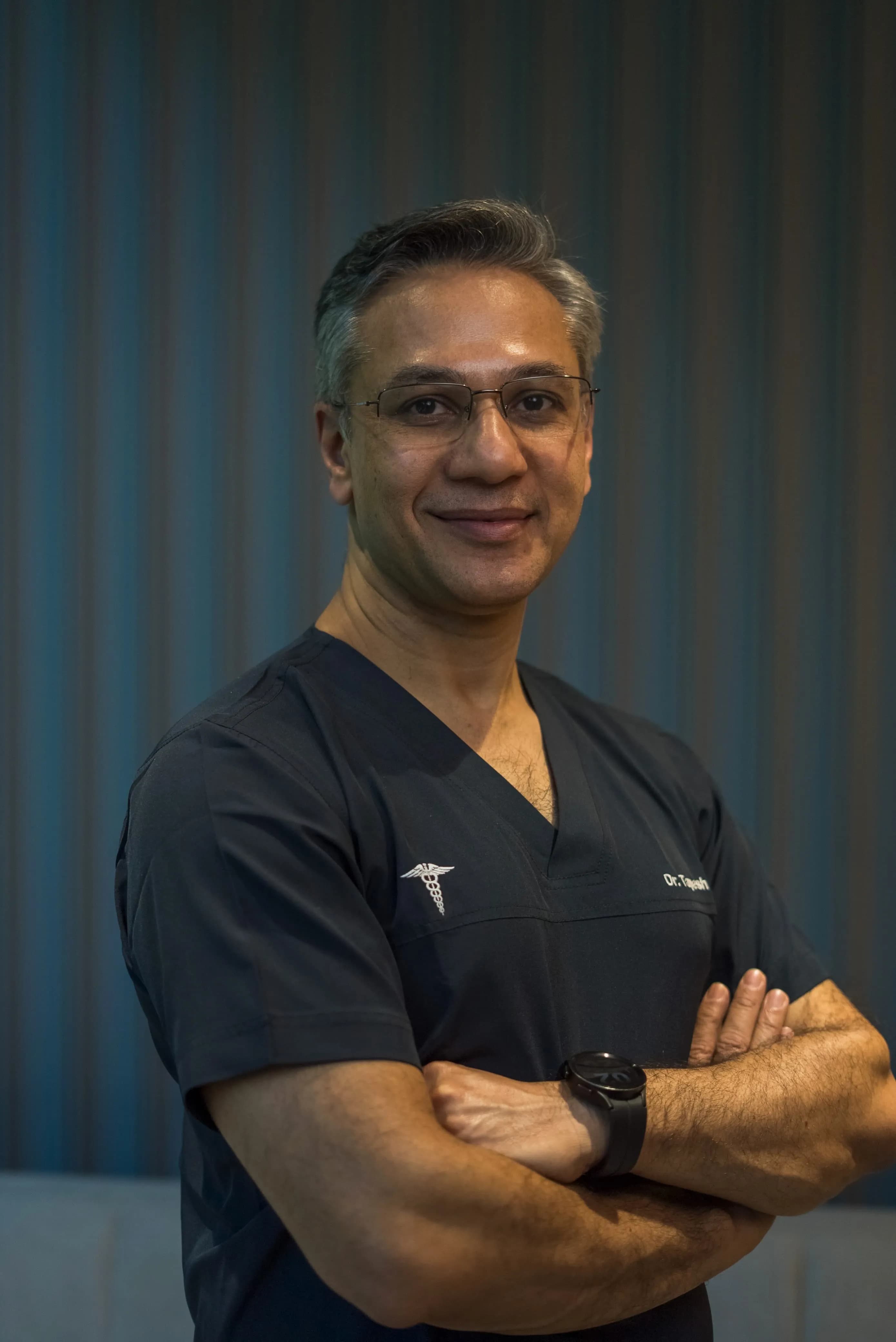 Dr. Tapesh Sharma